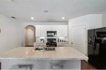 5946 Churchill Sq Way, Groveland, FL 34736 - Photo 10