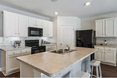 5946 Churchill Sq Way, Groveland, FL 34736 - Photo 12