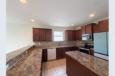 4876 Grassy Knoll Drive, Tavares, FL 32778 - Photo 12