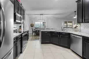 406 S Palm Ave, Howey in the Hills, FL 34737 - Photo 14