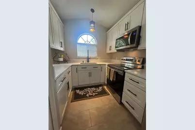 6738 Magnolia Pointe Circle, Orlando, FL 32810 - Photo 4