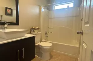 6738 Magnolia Pointe Cir, Orlando, FL 32810 - Photo 10
