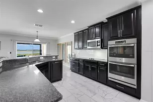 693 Black Eagle Dr, Groveland, FL 34736 - Photo 26