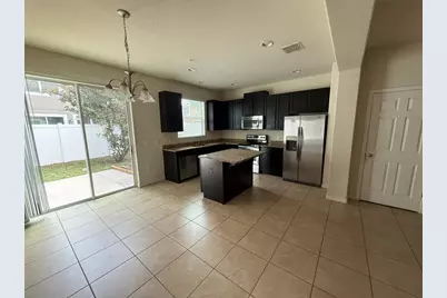 9571 Silver Buttonwood Street, Orlando, FL 32832 - Photo 4