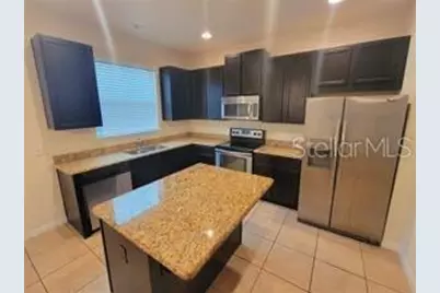 9571 Silver Buttonwood Street, Orlando, FL 32832 - Photo 2