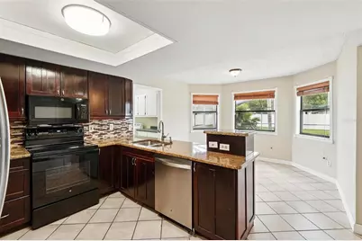 7925 Tumblestone Drive, Orlando, FL 32819 - Photo 18