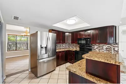 7925 Tumblestone Drive, Orlando, FL 32819 - Photo 16