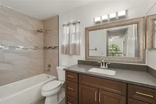 7925 Tumblestone Dr, Orlando, FL 32819 - Photo 30