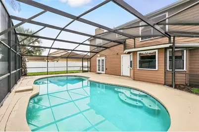 7925 Tumblestone Drive, Orlando, FL 32819 - Photo 36