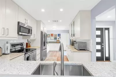 7517 Fenwick Cove Lane, Orlando, FL 32819 - Photo 30