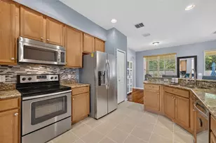 7438 Chelsea Harbour Dr, Orlando, FL 32829 - Photo 8