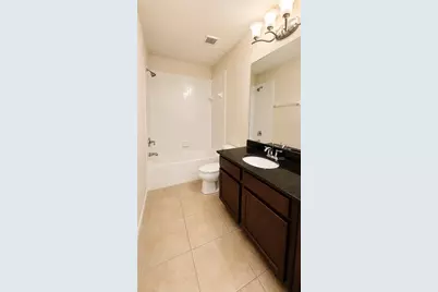 9551 Silver Buttonwood Street, Orlando, FL 32832 - Photo 12