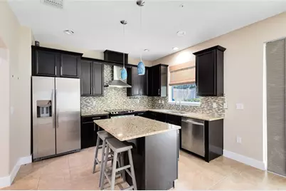9625 Silver Buttonwood Street, Orlando, FL 32832 - Photo 2