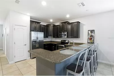 9039 Shadow Mountain Street, Champions Gate, FL 33896 - Photo 14