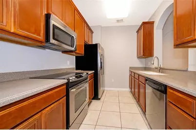 3338 Robert Trent Jones Drive #10604, Orlando, FL 32835 - Photo 6