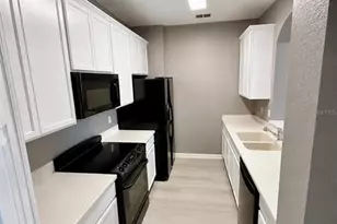 3332 Robert Trent Jones Dr, Orlando, FL 32835 - Photo 6