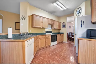 1019 Bridgeway Boulevard, Orlando, FL 32828 - Photo 14