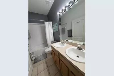 923 Bridgeway Boulevard, Orlando, FL 32828 - Photo 18