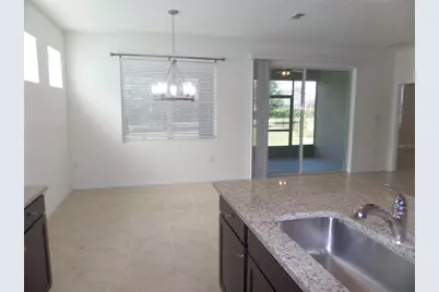 7997 Penrose Place, Wildwood, FL 34785 - Photo 10