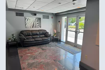 7345 W Sand Lake Road #307, Orlando, FL 32819 - Photo 2