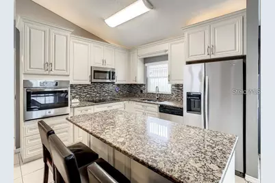 9655 Hollyhill Drive, Orlando, FL 32824 - Photo 2