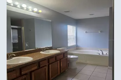 4406 Olympia Court, Clermont, FL 34714 - Photo 18