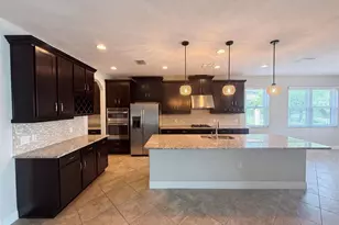 2575 Grand Lakeside Dr, Palm Harbor, FL 34684 - Photo 4