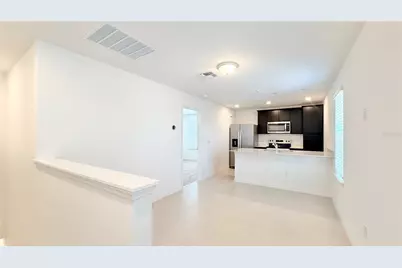 5694 Enchanted Meadow Alley #B, Clermont, FL 34714 - Photo 4