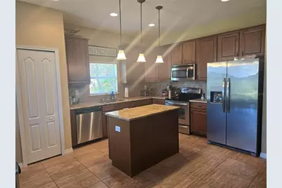 8451 Karpeal Drive, Sarasota, FL 34238 - Photo 6