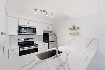 6074 Peregrine Avenue #B02, Orlando, FL 32819 - Photo 4