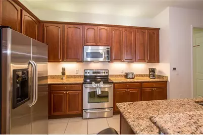5049 Shoreway Loop #407, Orlando, FL 32819 - Photo 12