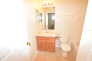 9796 Tivoli Villa Dr, Orlando, FL 32829 - Photo 28