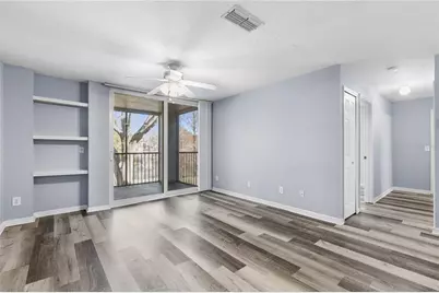 7605 Pissarro Drive #13204, Orlando, FL 32819 - Photo 2