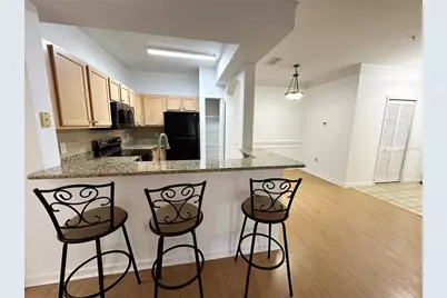 12843 Madison Pointe Circle E #201, Orlando, FL 32821 - Photo 6