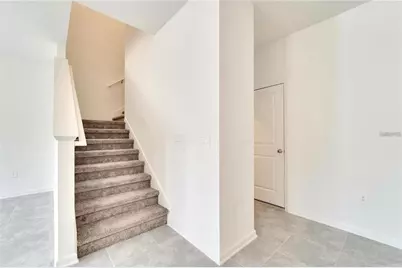 9038 Mulligan Island Lane, Champions Gate, FL 33896 - Photo 6