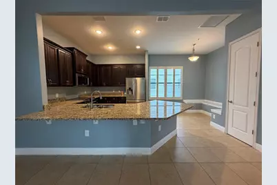 12952 Brandon Coates Drive, Orlando, FL 32828 - Photo 10