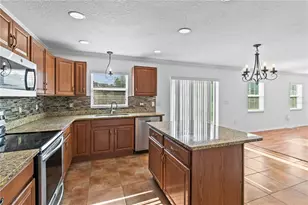 8830 Isla Bella Dr, Orlando, FL 32818 - Photo 10
