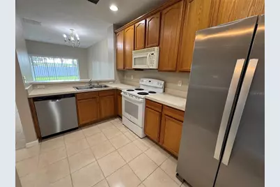 9472 Flowering Cottonwood Road #77, Orlando, FL 32832 - Photo 2
