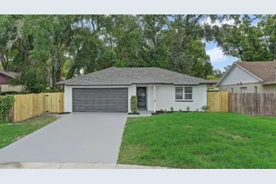 7711 Lakeside Woods Drive, Orlando, FL 32810 - Photo 1