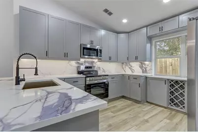 7711 Lakeside Woods Drive, Orlando, FL 32810 - Photo 14