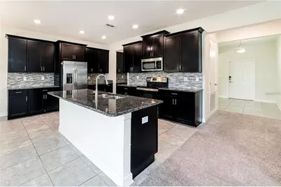 9850 Magnolia Woods Boulevard, Orlando, FL 32832 - Photo 6