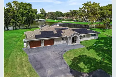 1002 Loves Point Drive, Leesburg, FL 34748 - Photo 54