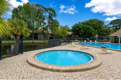5836 Peregrine Avenue #25E, Orlando, FL 32819 - Photo 20
