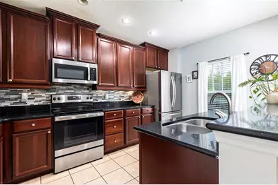 9743 Biscotti Avenue, Orlando, FL 32829 - Photo 6