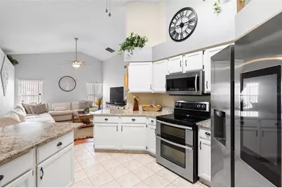 12512 Tillingham Court, Orlando, FL 32837 - Photo 8