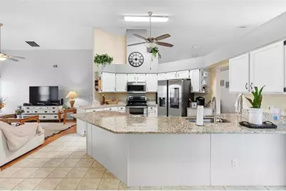 12512 Tillingham Court, Orlando, FL 32837 - Photo 6