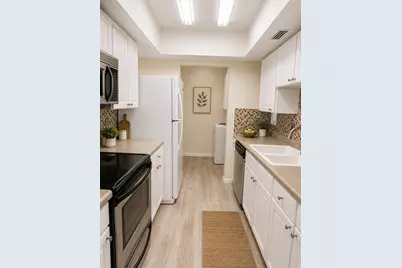 6057 Windhover Drive #E-08, Orlando, FL 32819 - Photo 4