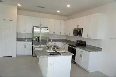 1677 Way Of Peace Lane, Mascotte, FL 34753 - Photo 6