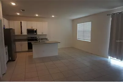 1677 Way Of Peace Lane, Mascotte, FL 34753 - Photo 8