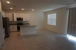 1677 Way of Peace Ln, Mascotte, FL 34753 - Photo 8